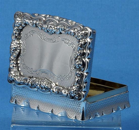 A Victorian silver rectangular table snuff box, by Yapp & Woodward, Length: 102mm Weight: 8.8oz/274grms